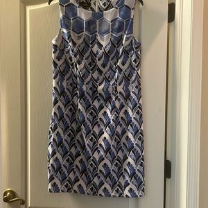 Ladies dress white background and blue black print. In great condition.